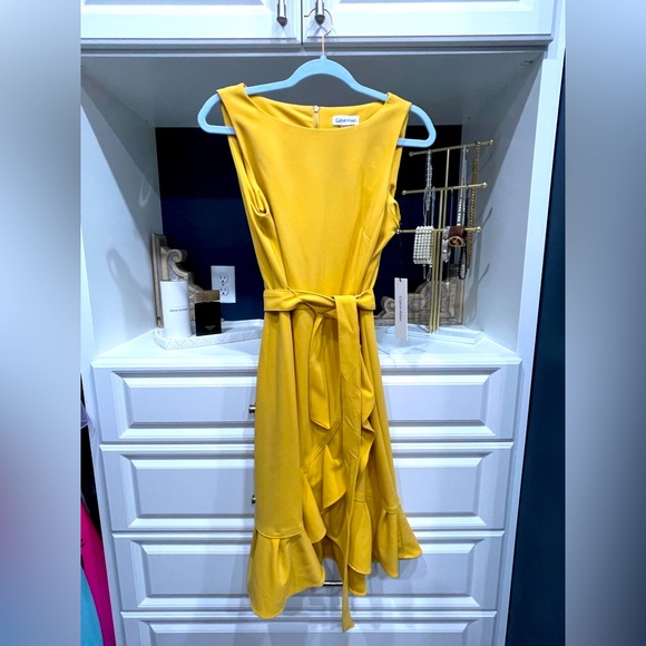 Dresses & Skirts - CALVIN KLIEN  Size 8 YELLOW  DRESS NEW W/TAGS ON ROUND NECK SLEEVELESS R…